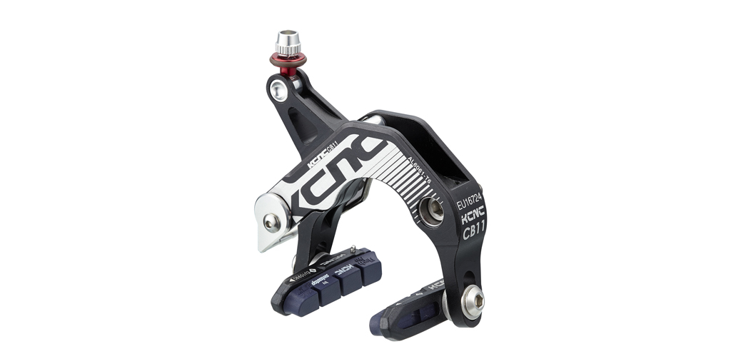 Road brake caliper